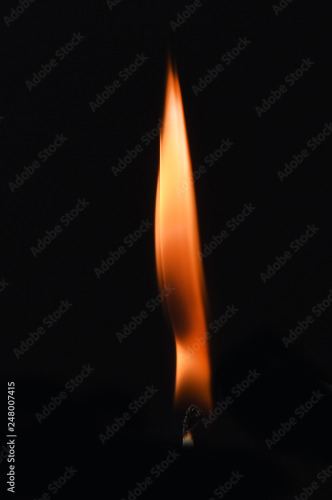 candle flame on a black background candle flame on a black background