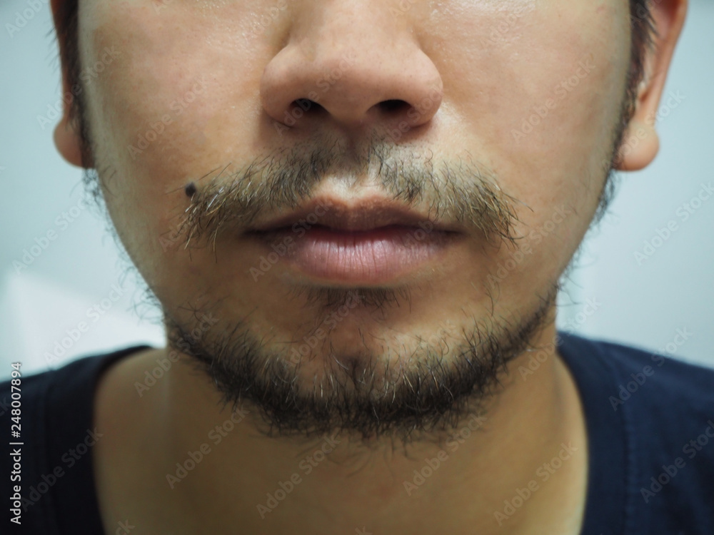 close up detail of male mouth have beard and mustache close up detail of male mouth have beard and mustache