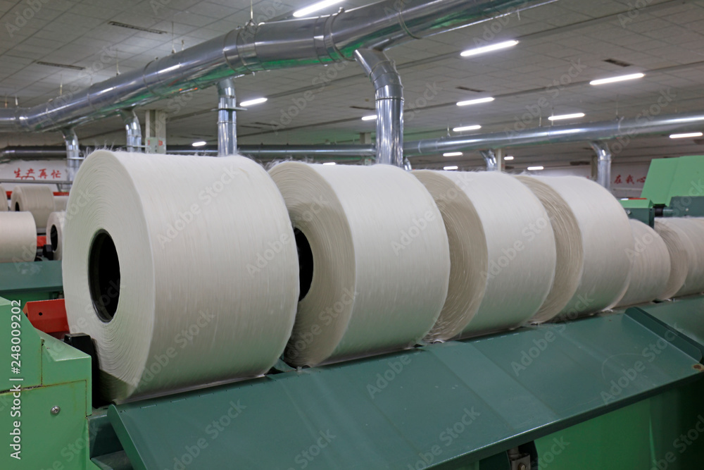 Cotton yarn on the spinning machine Cotton yarn on the spinning machine