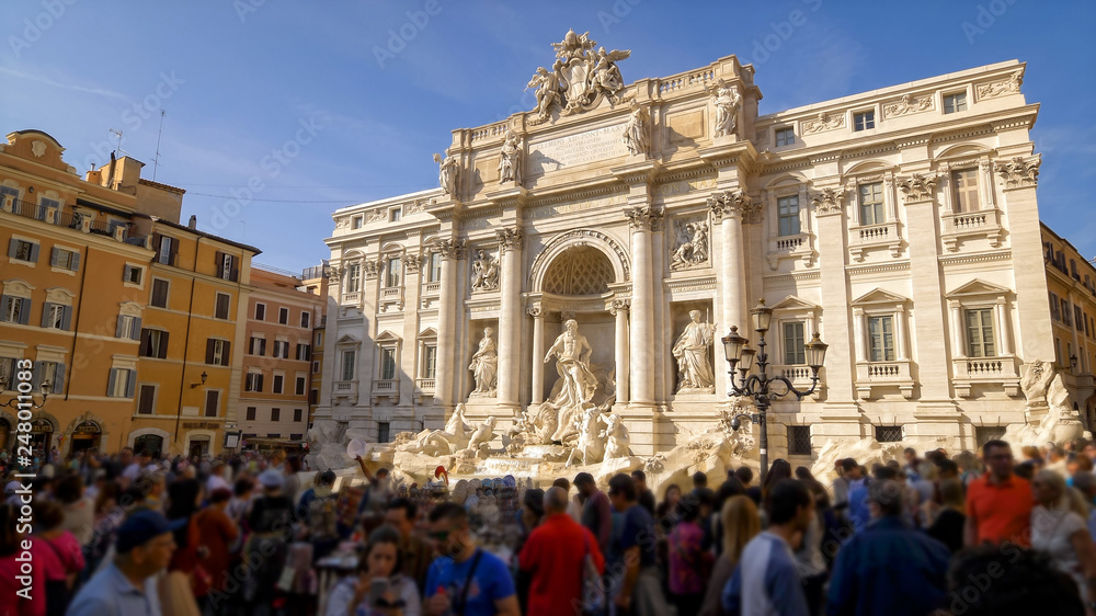 Tourists at Trevi Fountain in Rome, Italy (faces blurred for commercial use)