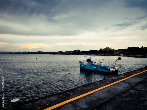 Boats, boats and old yachts near the pier. Port in the town of Pomorie, Bulgaria