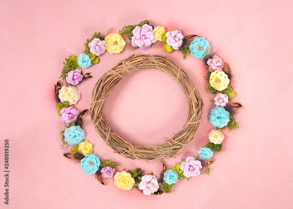 A wreath of multicolored paper flowers on the Living Coral background . Valentine day. love concept. Spring mood. Space for text. Wide banner - Image.