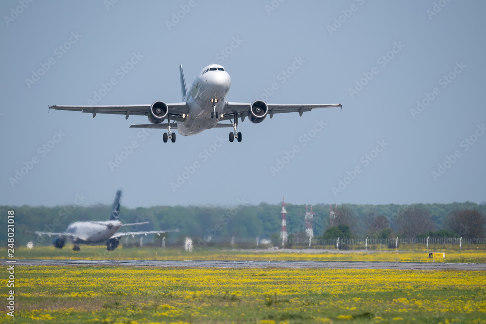 Airplane take of at the airport in Bucharest Airplane take of at the airport in Bucharest