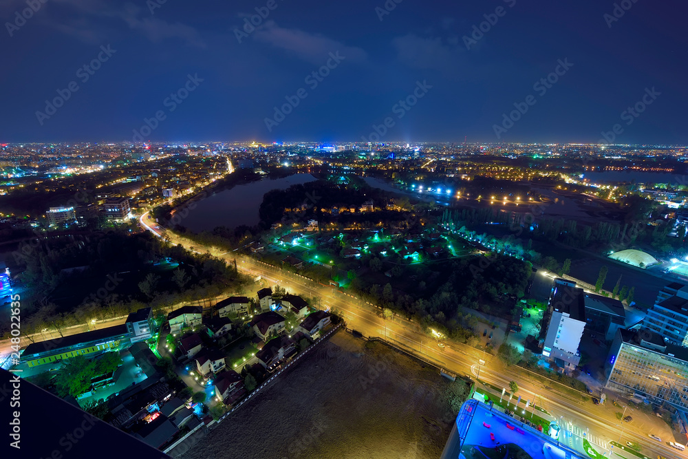 Panoramic view over Bucharest at night, Romanian capital city 