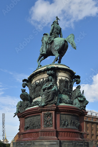 Baroque Monument to Russian Emperor Nikolay I on St Isaac's Square. It was designed in 1856. Pedestal is decorated with allegorical female figures of Wisdom, Force, Faith and Justice