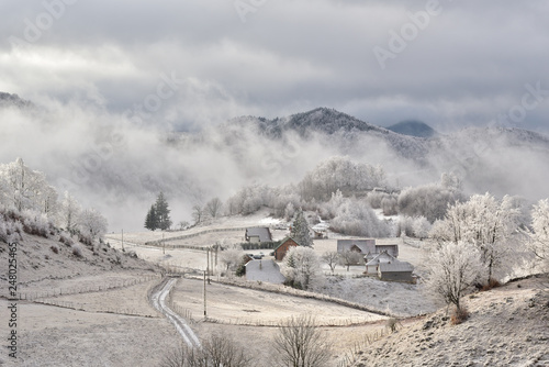 Frost landscape in winter time over mountains of Transylvania , Romania landscape 