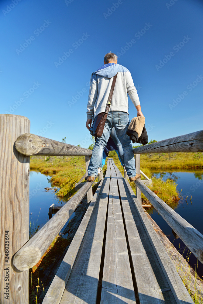 Walk along the bridge in the nature park