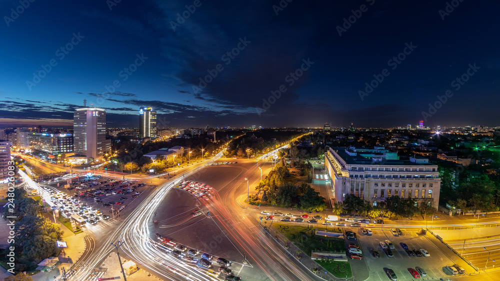 Bucharest skyline cityscape with night traffic , Romania Bucharest skyline cityscape with night traffic , Romania