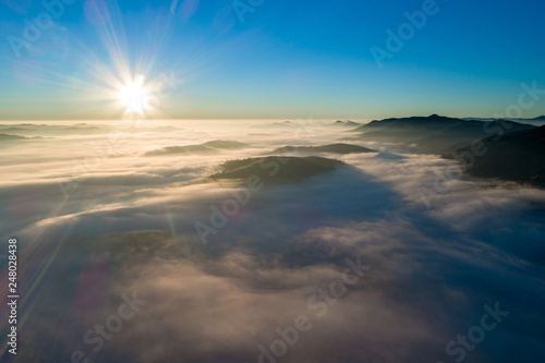 Romanian landscape in Transylvania aerial view from drone at sunrise 