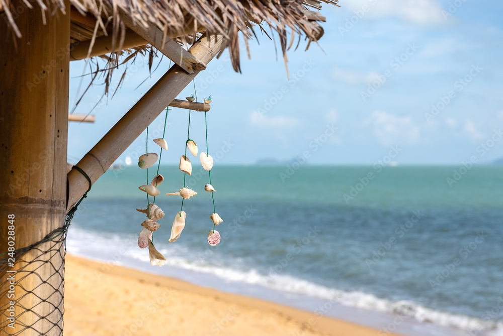 Ταπετσαρία wind chime at a wooden hut at Mae Nam beach on Ko Samui island, Thailand, Asia