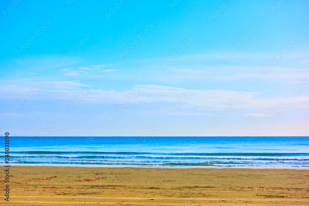 Sandy beach and sea horizon