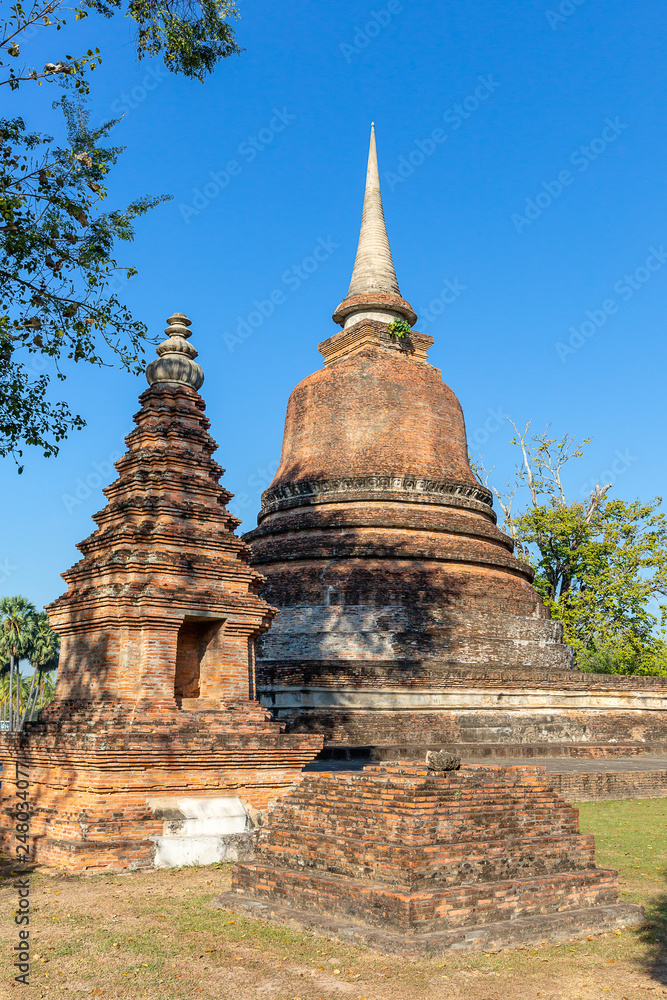 stupa and Prang tower in the Historical Park of Sukhothai, Thailand, Asia