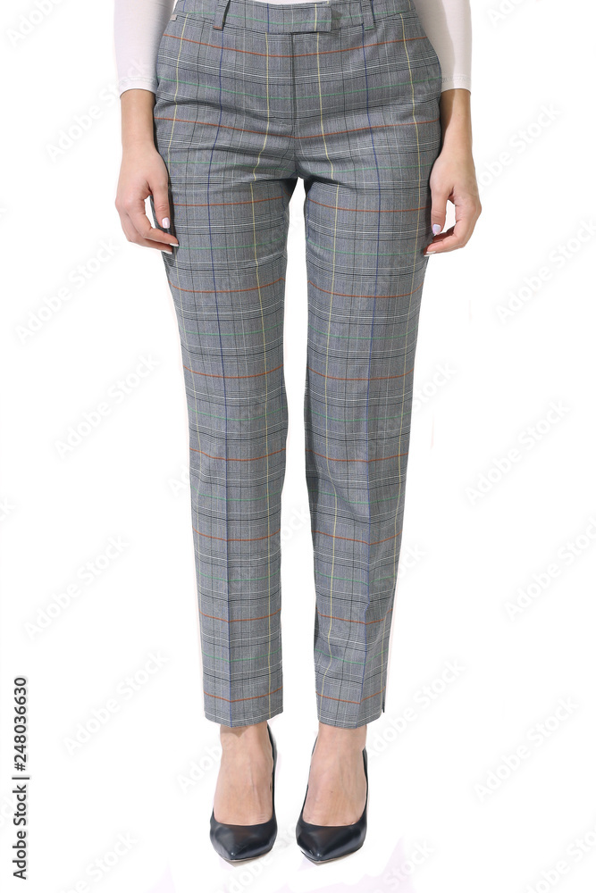 checked trousers with stripes on model legs with white stiletto heels checked trousers with stripes on model legs with white stiletto heels