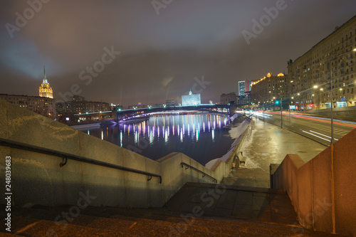 The night winter Moscow image. The House of the Government of the Russian Federation (the Russian White House) in distance. It is a government building on the Krasnopresnenskaya embankment. photo