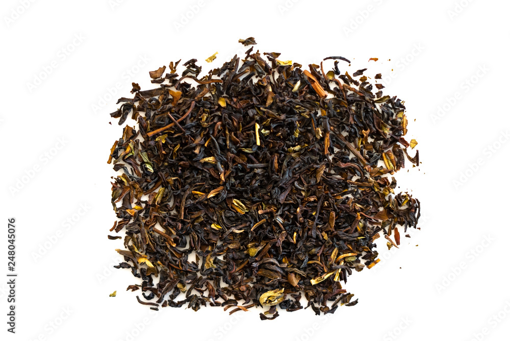 Black tea loose dried tea leaves, isolated on the white background Black tea loose dried tea leaves, isolated on the white background