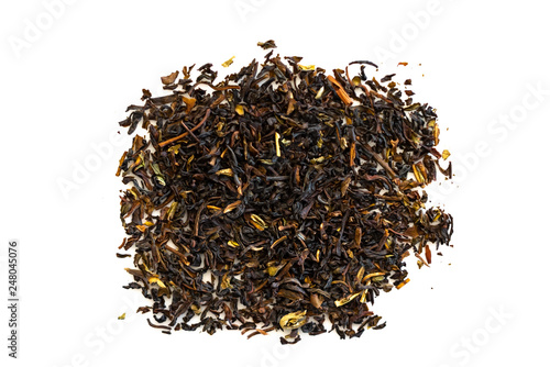 Black tea loose dried tea leaves, isolated on the white background
