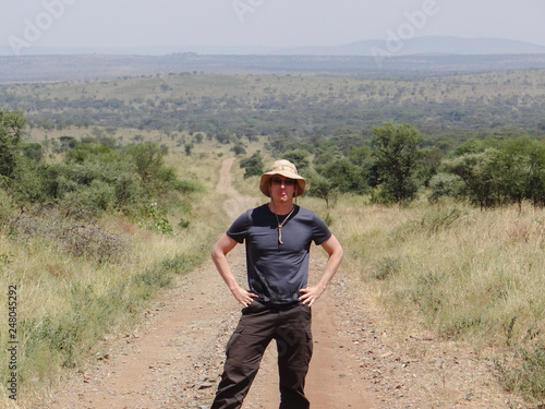 Male Tourist on a safari in the Ngorongoro Crater ion Tanzania, Africa. © Christopher