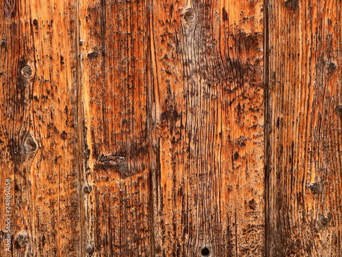 Wooden brown boards assembled as a wall