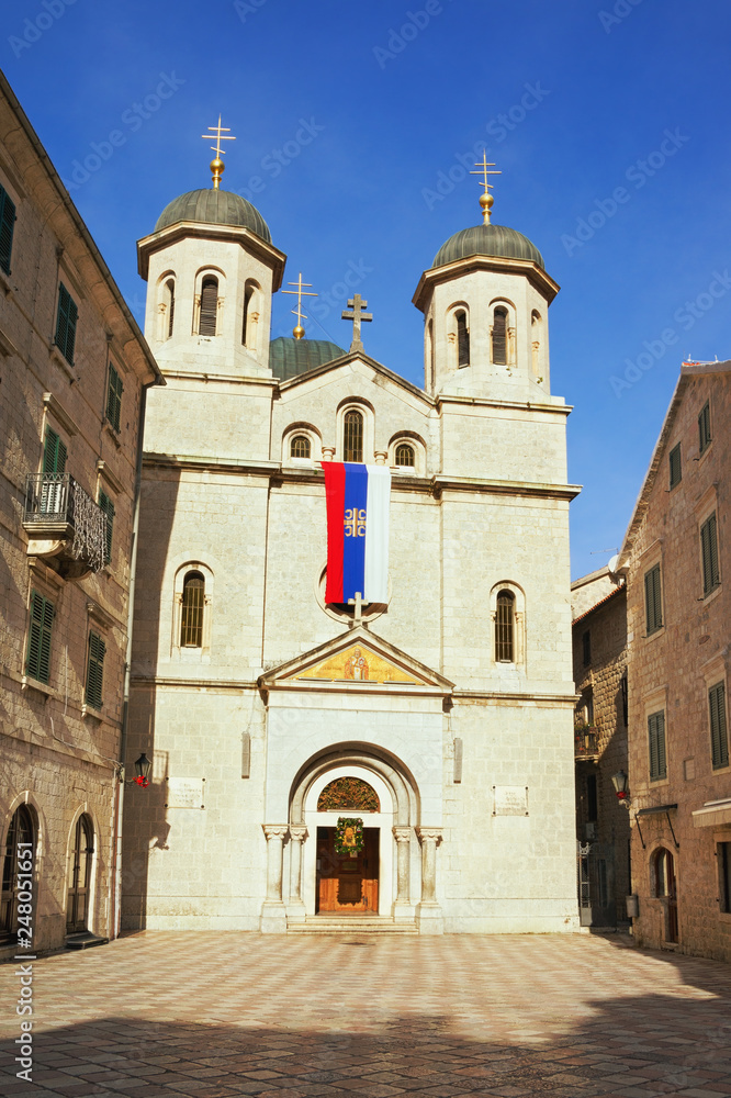 Religious architecture. Montenegro, Old Town of Kotor - UNESCO World Heritage site.  View of Serbian Orthodox Church of St. Nicholas on sunny winter day
