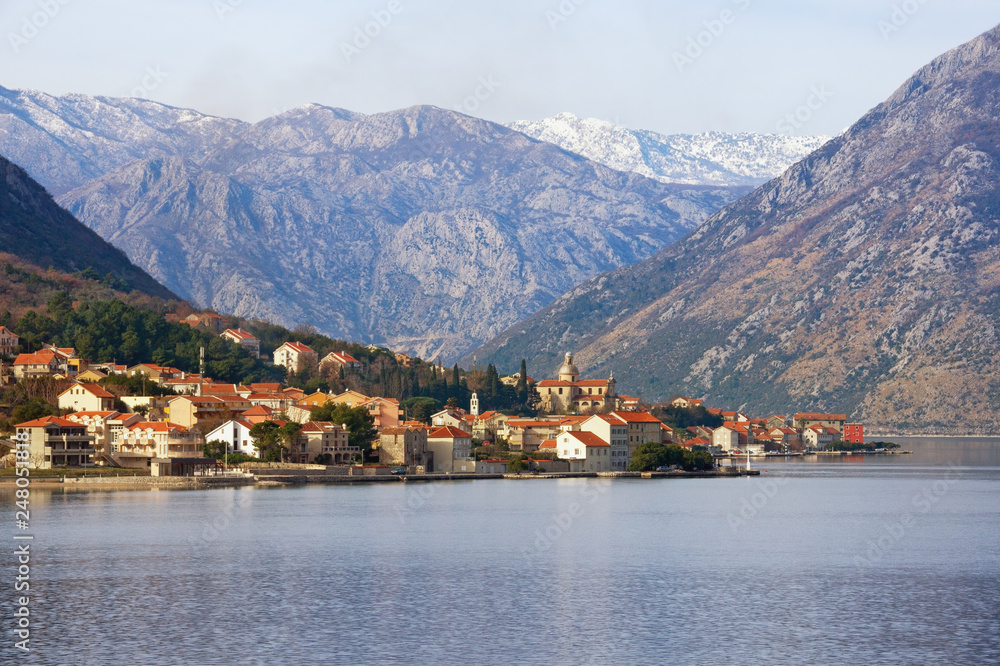 Beautiful Mediterranean landscape on winter day.  Montenegro, Adriatic Sea, Bay of Kotor, view of Prcanj town