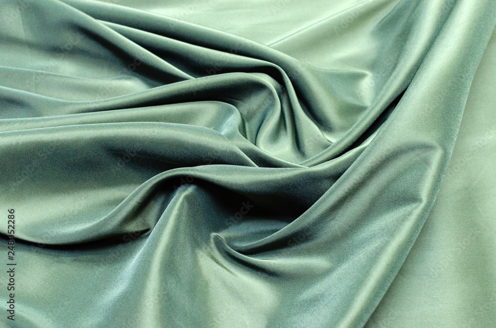 Dark green lining fabric from viscose, acetate and elastane - obrazy, fototapety, plakaty 