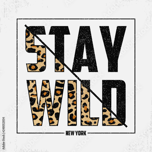 Stay Wild - composite slogan with leopard texture. T-shirt typography print with animal skin. Tee shirt trendy print. Vector illustration.