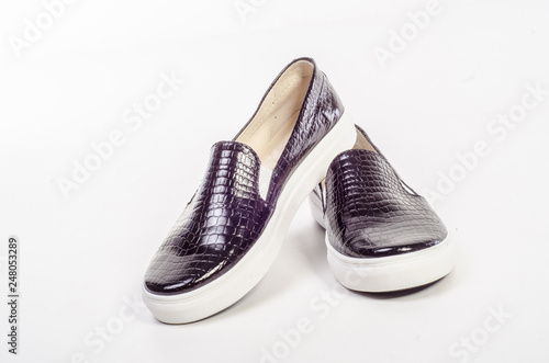 Women's flat photo black shoes isolated on white background photo