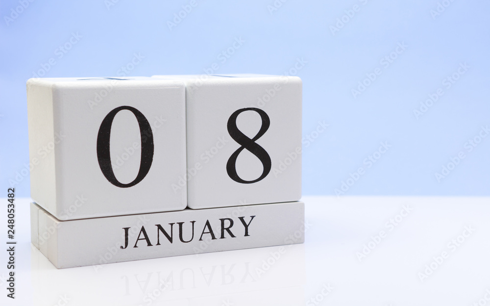 January 08st. Day 08 of month, daily calendar on white table with reflection, with light blue background. Winter time, empty space for text January 08st. Day 08 of month, daily calendar on white table with reflection, with light blue background. Winter time, empty space for text