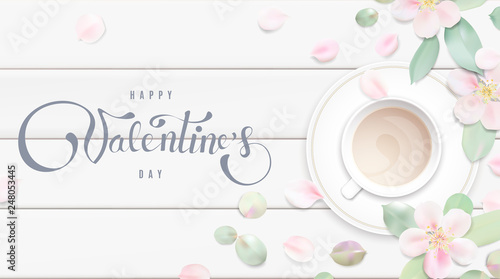 Happy Valentine's day soft color pastel background with flower petals and lettering.
