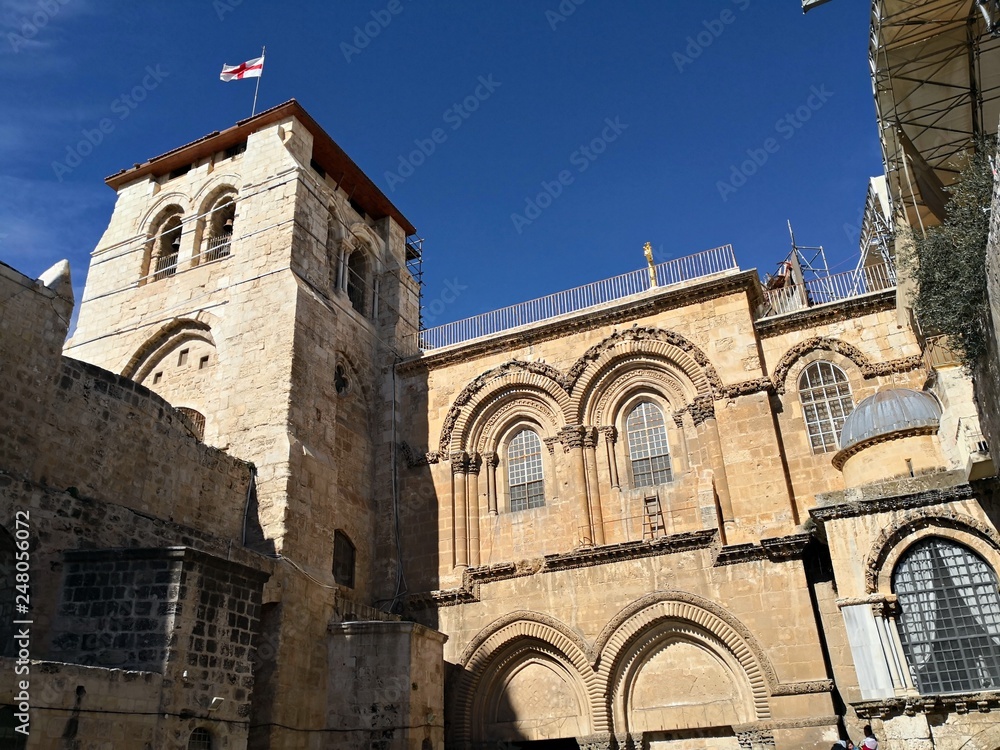 JERUSALEM, ISRAEL - JANUARY 19, 2019 : Pilgrims at the Church of the Holy Sepulchre in Jerusalem, Israel.