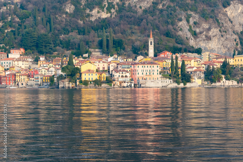 View of many color buildings in beautiful village Varenna, Como lake, Italy