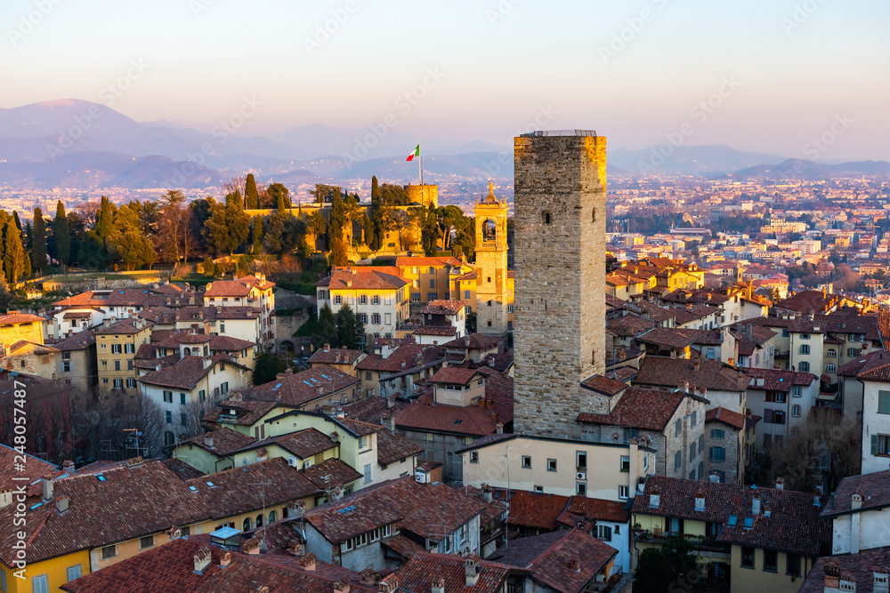 Scenic landscape view of the old town city center of the historical buildings during the sunset, Citta Alta, Bergamo, Italy