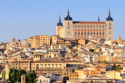 Toledo cityscape with Alcazar fortification on the top of the hill, Castile-La Mancha, Spain © GarkushaArt