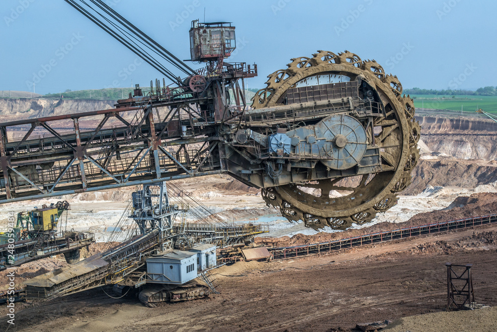 Biggest excavator in the world working, Bagger 228, Ukraine. Big mine, develop mineral resources, excavator digs, metallurgy in Ukraine