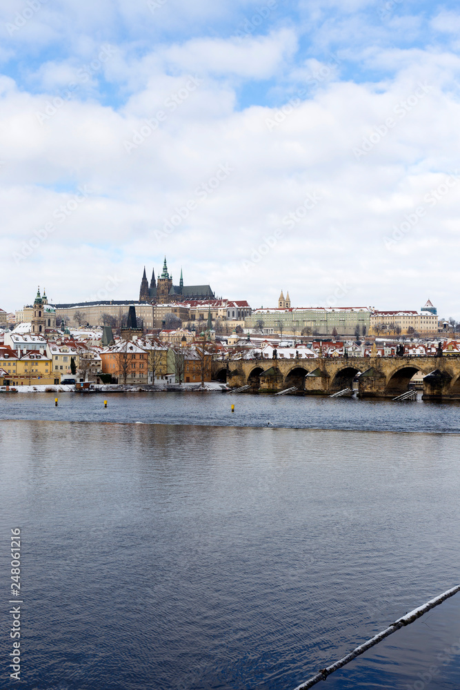 Snowy Prague Lesser Town with Prague Castle and Charles Bridge, Czech republic