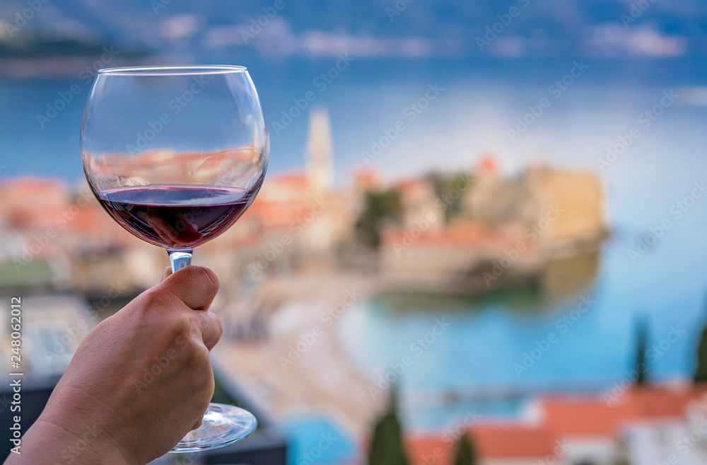 Drinking red wine in Budva