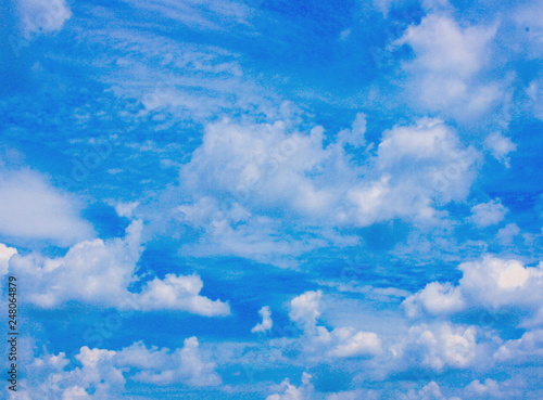 Cloudscape with bright blue sky for background