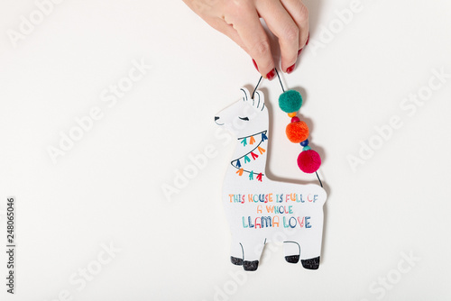 Wooden Llama on white background photo