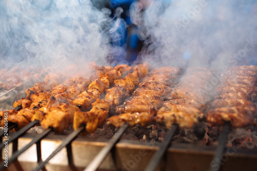 фотографія Chicken shish Kebab or kebap meat on metal skewer barbecue and embers in the Turkish restaurant