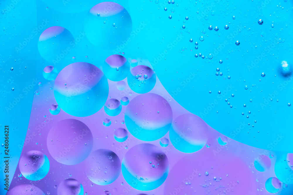 Water and oil bubble background. Macro shot of beautiful Water and oil bubble background , with small and big bubbles Water and oil bubble background. Macro shot of beautiful Water and oil bubble background , with small and big bubbles
