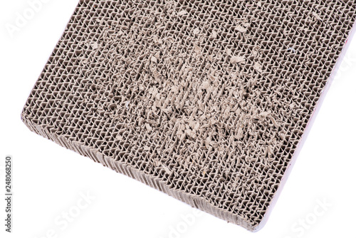 Reversible cat scratcher made of 100% recycled cardboard isolated on white background. Cat Paper Toy for Scratching and Exercise.
