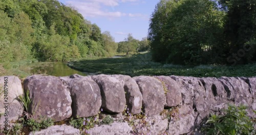 Dry Stone Bridge over River Wye near Milldale, Derbyshire Dales, Derbyshire, England, UK, Europe photo