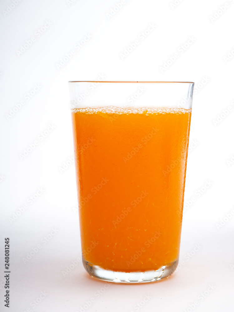 Glass of orange juice on white Glass of orange juice on white