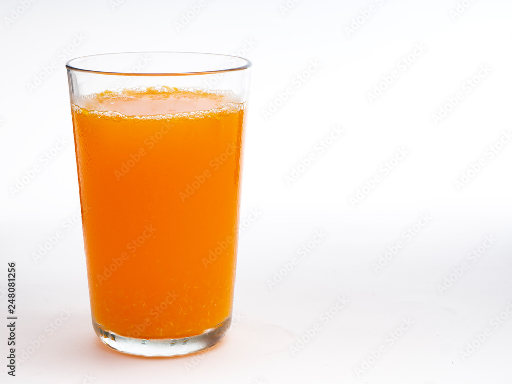 Glass of orange juice on white Glass of orange juice on white