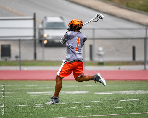Konstfotografi Young athletes making amazing plays while playing Lacrosse