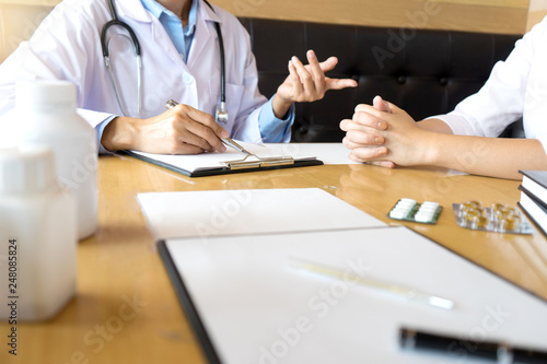 doctor explaining patient symptoms or asking a question