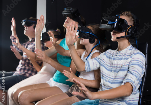 Young family is watching VR