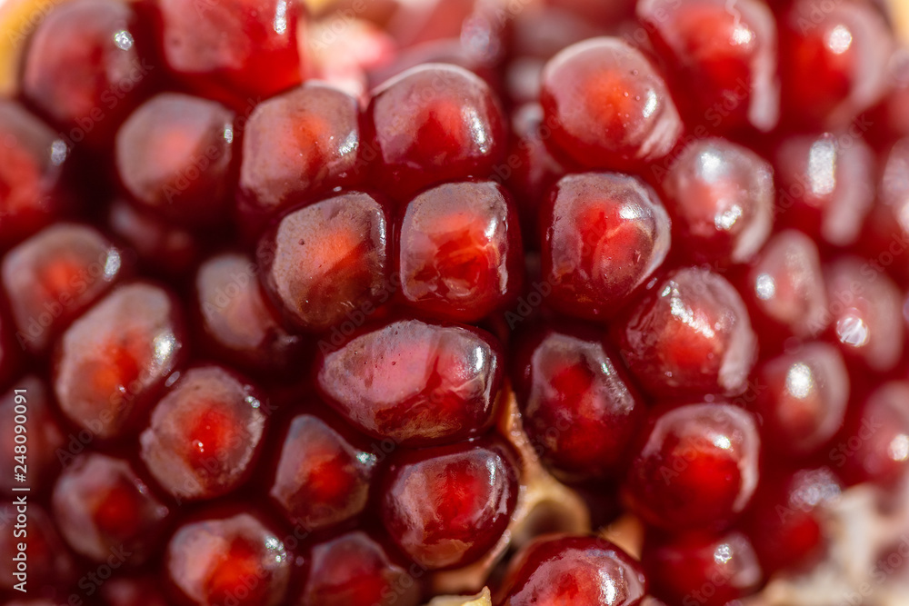 open pomegranate on a white background open pomegranate on a white background