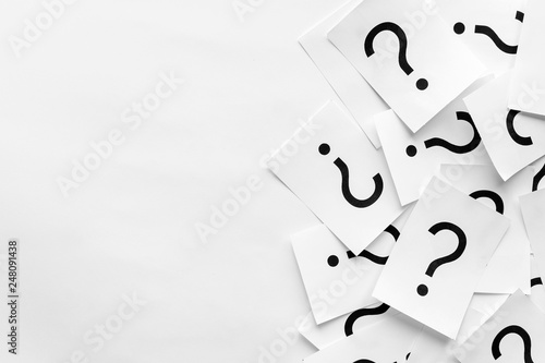 Photos Pile of question marks printed on white cards