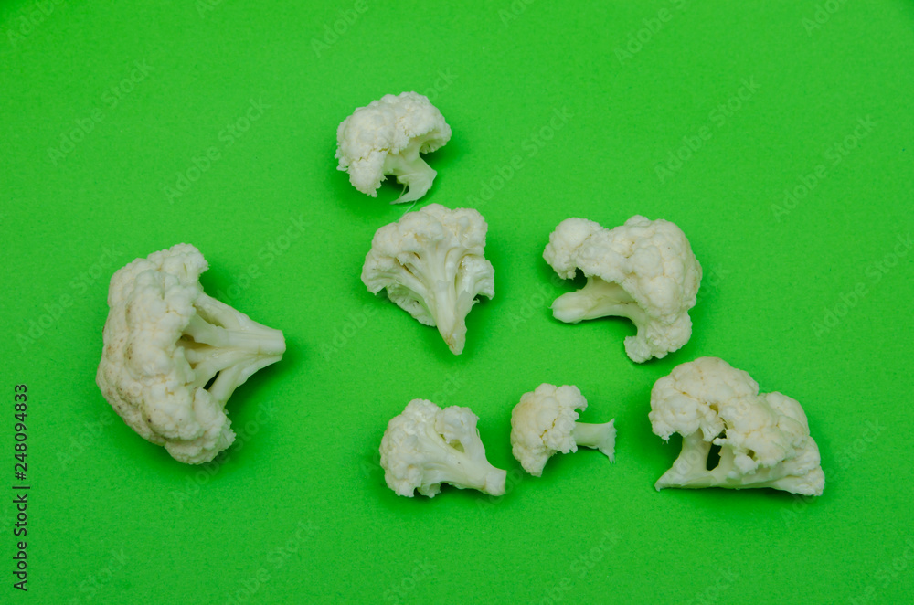 Fototapeta premium set of cauliflower top view, cauliflower on a green background
